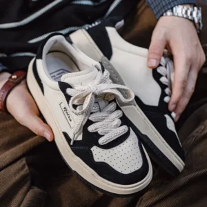 UrbanSlice™ Men’s Bold Spliced Black & White Leather Low-Top Sneakers 1