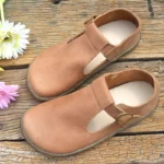 TessaBelt Classic™ | Handmade Women's T-Strap Cowhide Leather Flats – Retro British Big Toe Shoes with Buckle Strap 3